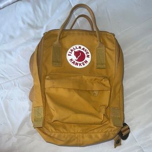 mini yellow fjallraven kanken backpack
